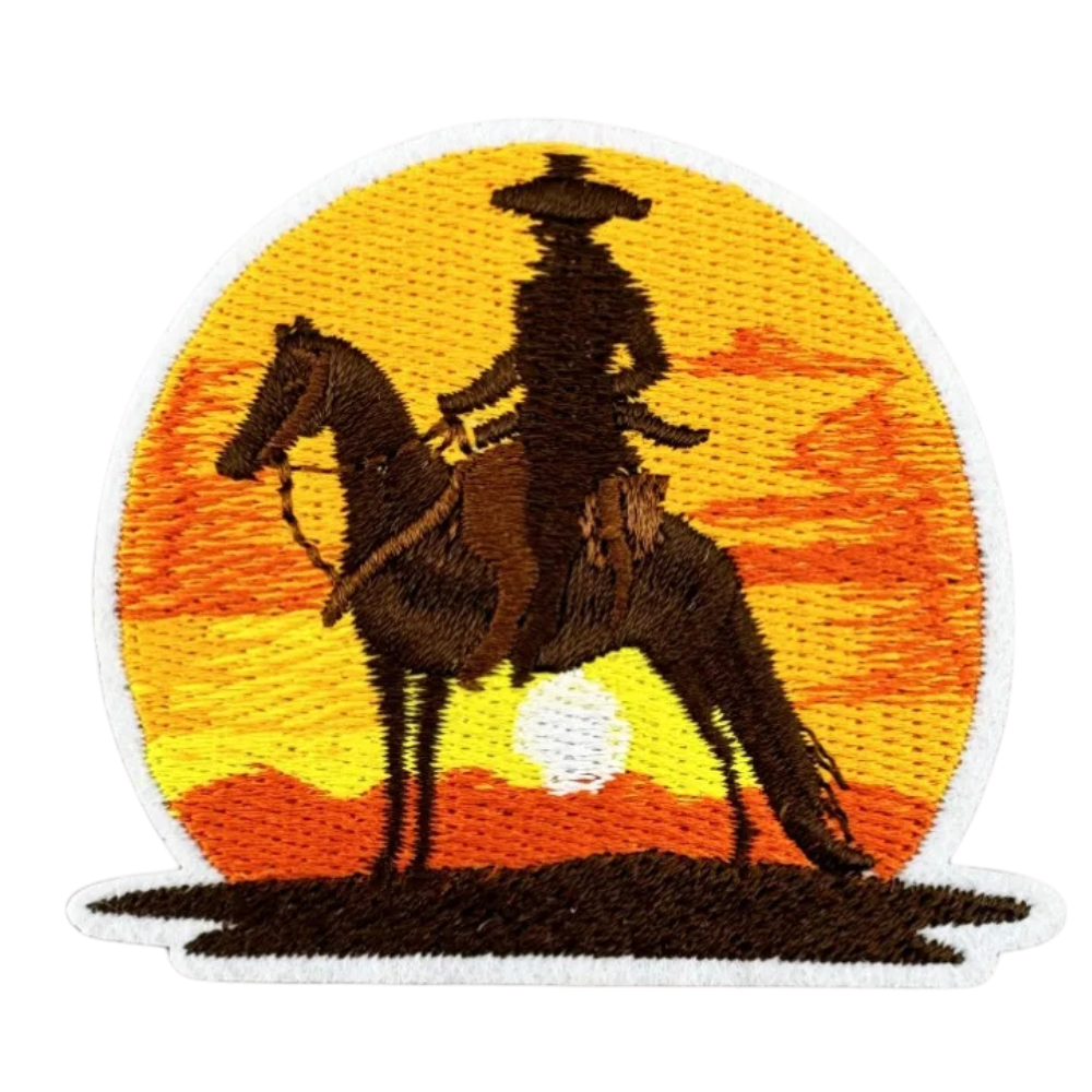 Solnedgångsridande cowboywestern broderad patch